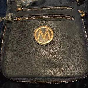 BNWT “Michael Kors” expandable cross body